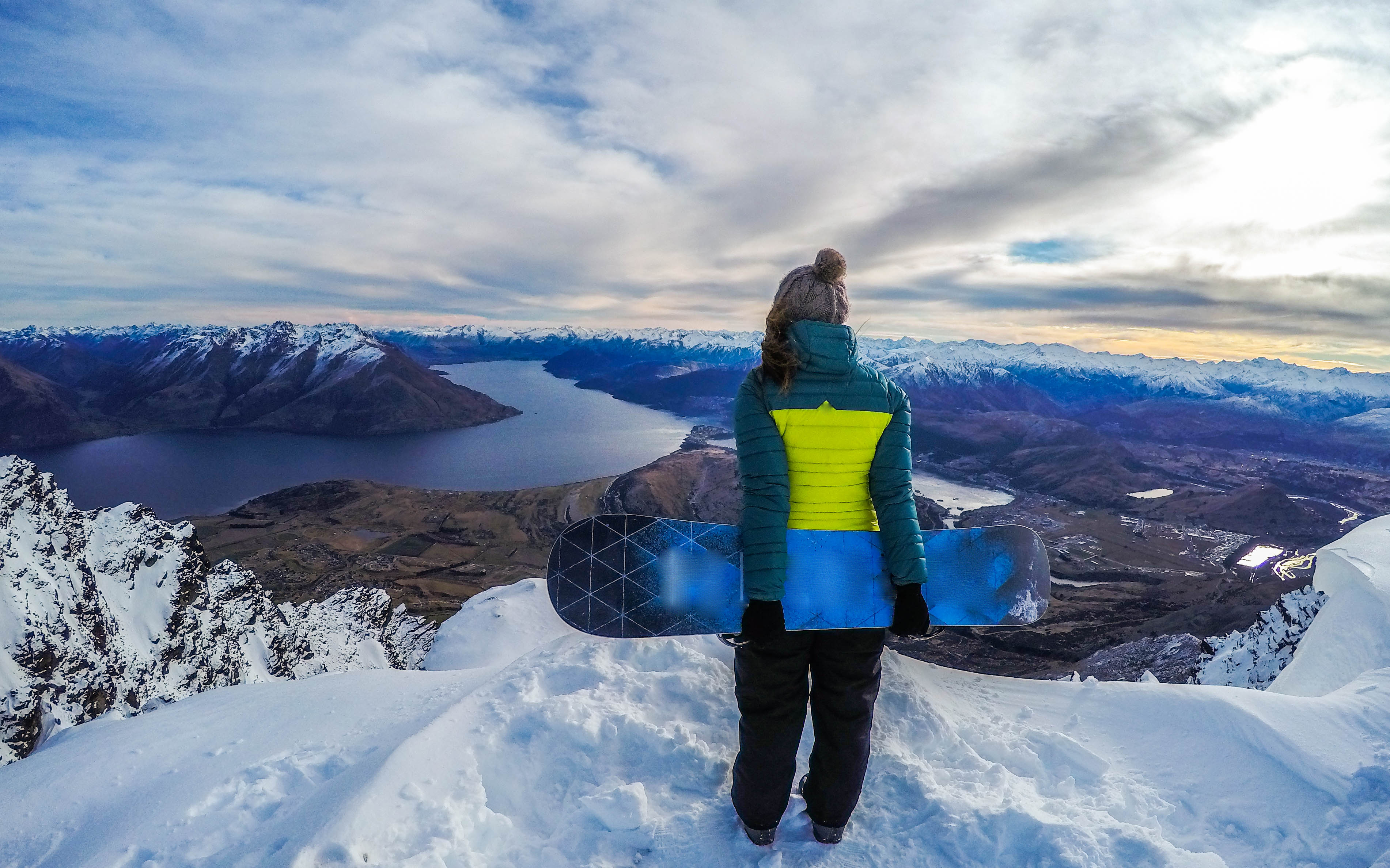 Winter,sport,activity.woman,holding,snowboard,,overlooking,mountain,landscape,freedom,,enjoying